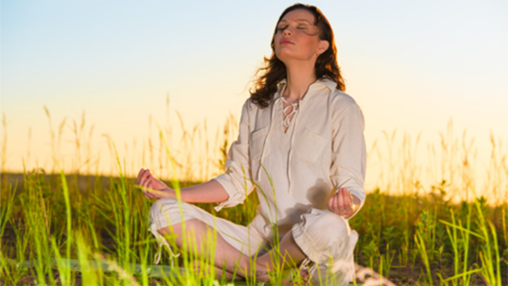 Woman practicing meditation for pain management